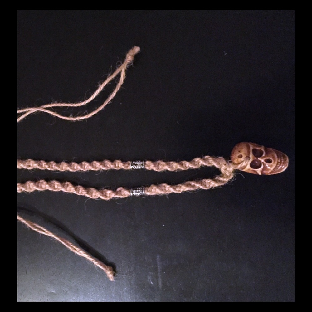 Human skull head necklace